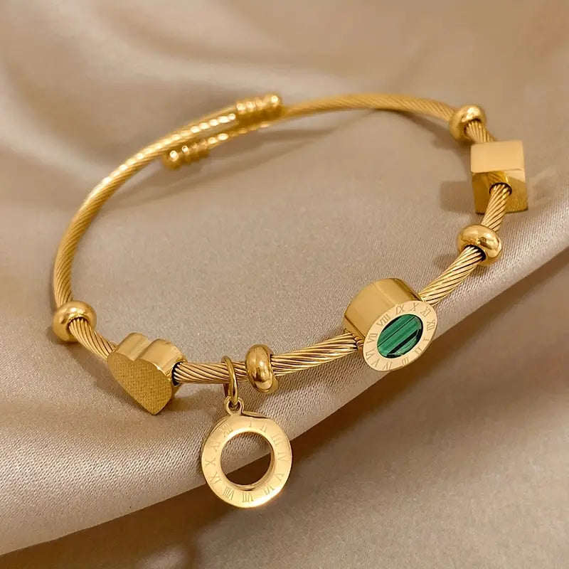 Rhian – Armband Gold Signatur