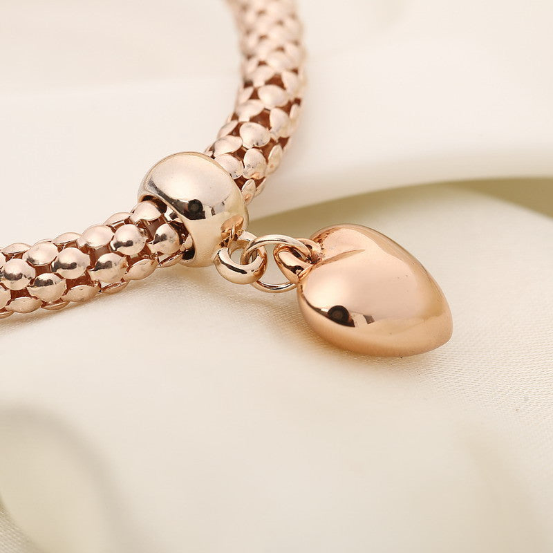 Aria – Armband aus Metall mit soliden Herzen