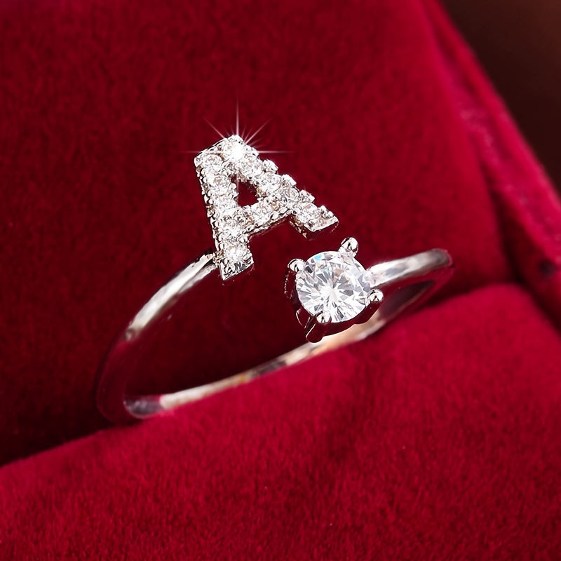 Nova – Moderner Offener Ring mit Initiale und Zirkonia