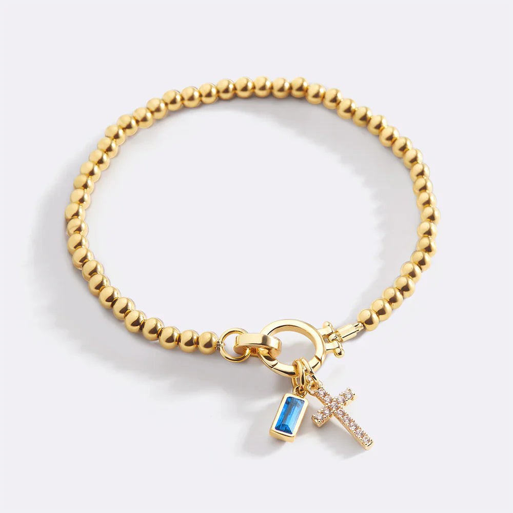 Eli – Geburtsstein-Armband mit Kreuzanhänger