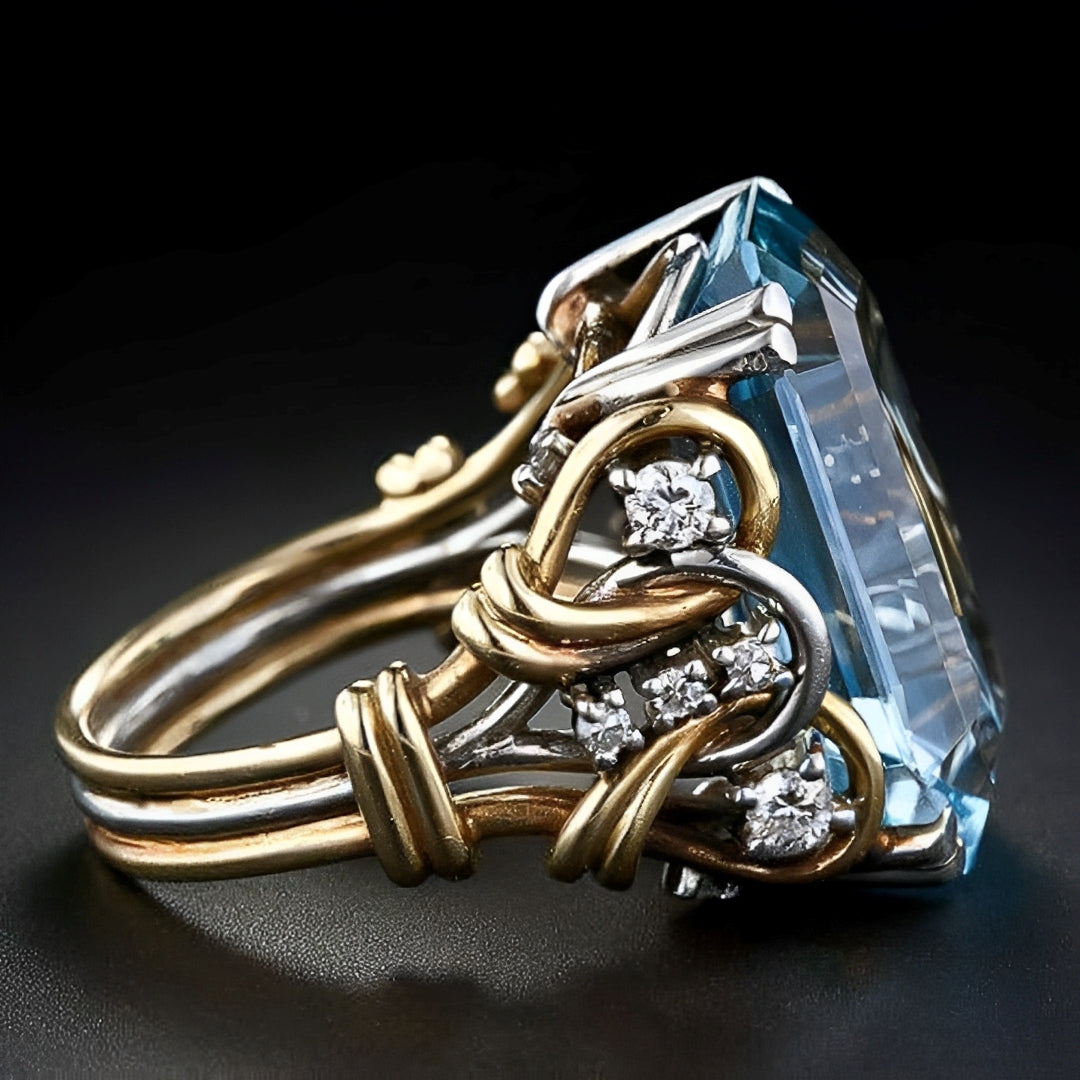 Eliane – Retro-Ring mit intensivem blauem Zirkonia