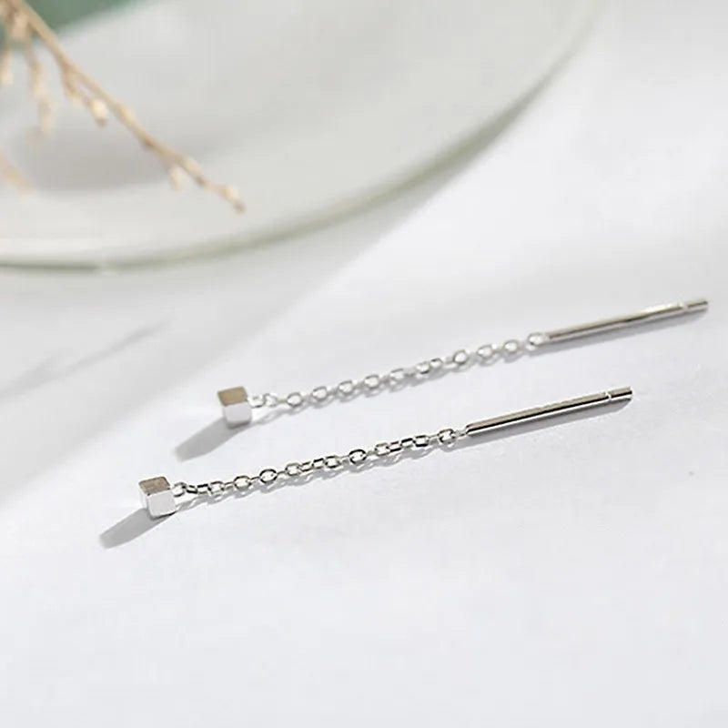 Kaelen – Ohrringe Würfel und Elegante Quasten