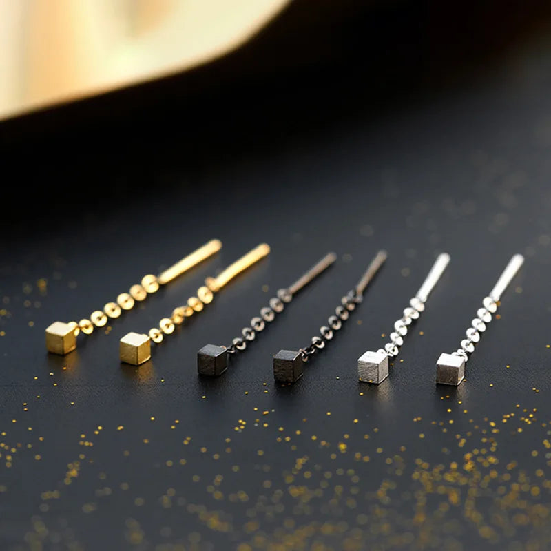 Kaelen – Ohrringe Würfel und Elegante Quasten