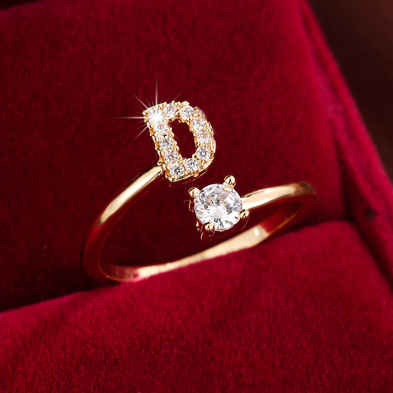 Nova – Moderner Offener Ring mit Initiale und Zirkonia
