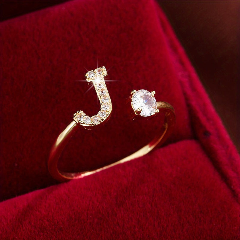 Nova – Moderner Offener Ring mit Initiale und Zirkonia