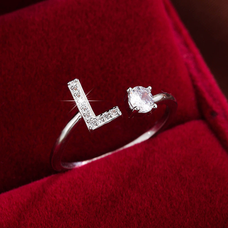 Nova – Moderner Offener Ring mit Initiale und Zirkonia