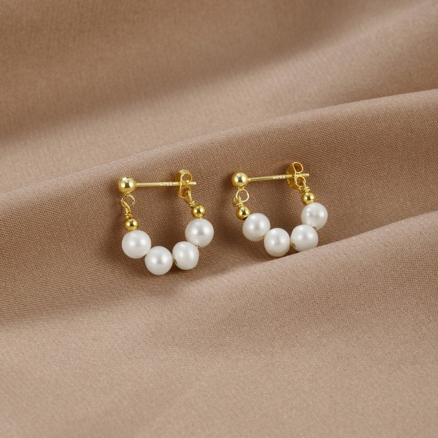 Yowe – Kreolen Perle von goldenem Glanz