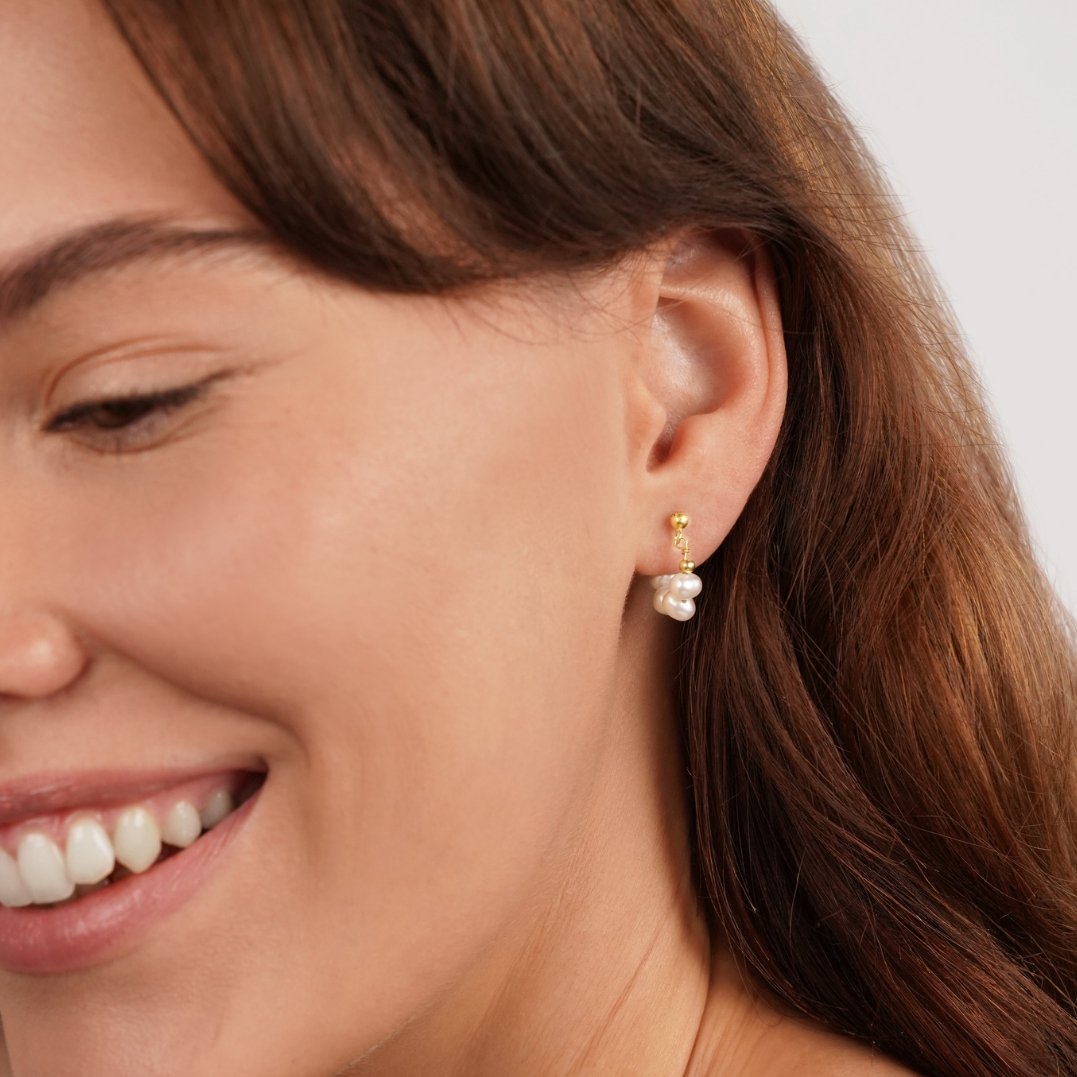 Yowe – Kreolen Perle von goldenem Glanz