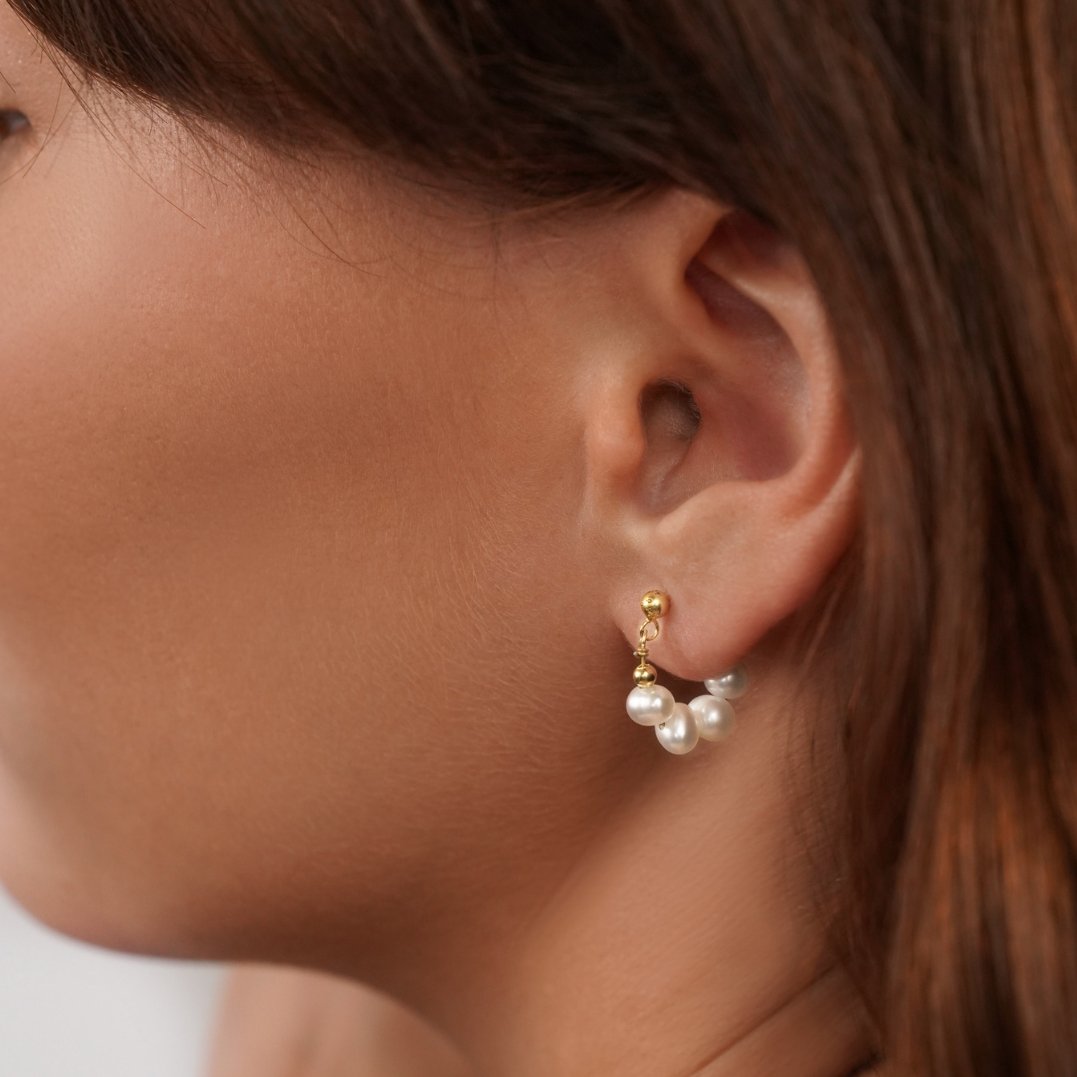 Yowe – Kreolen Perle von goldenem Glanz