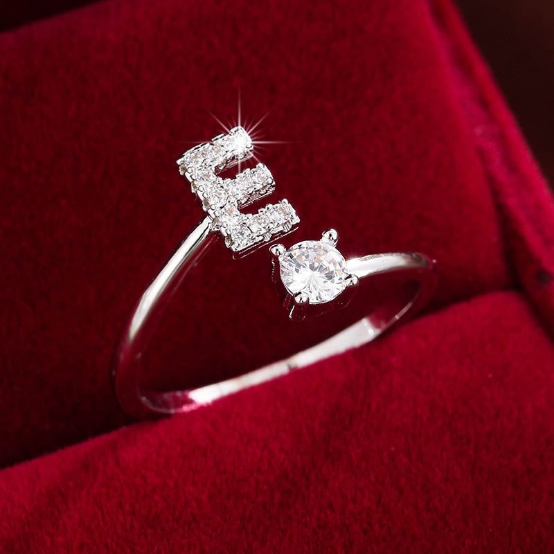 Nova – Moderner Offener Ring mit Initiale und Zirkonia
