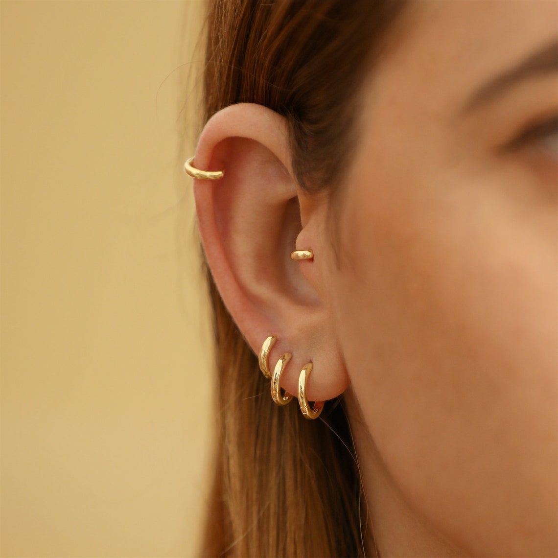 Gold Huggie-Ohrringe - 7 Stück Hoop-Ohrringe