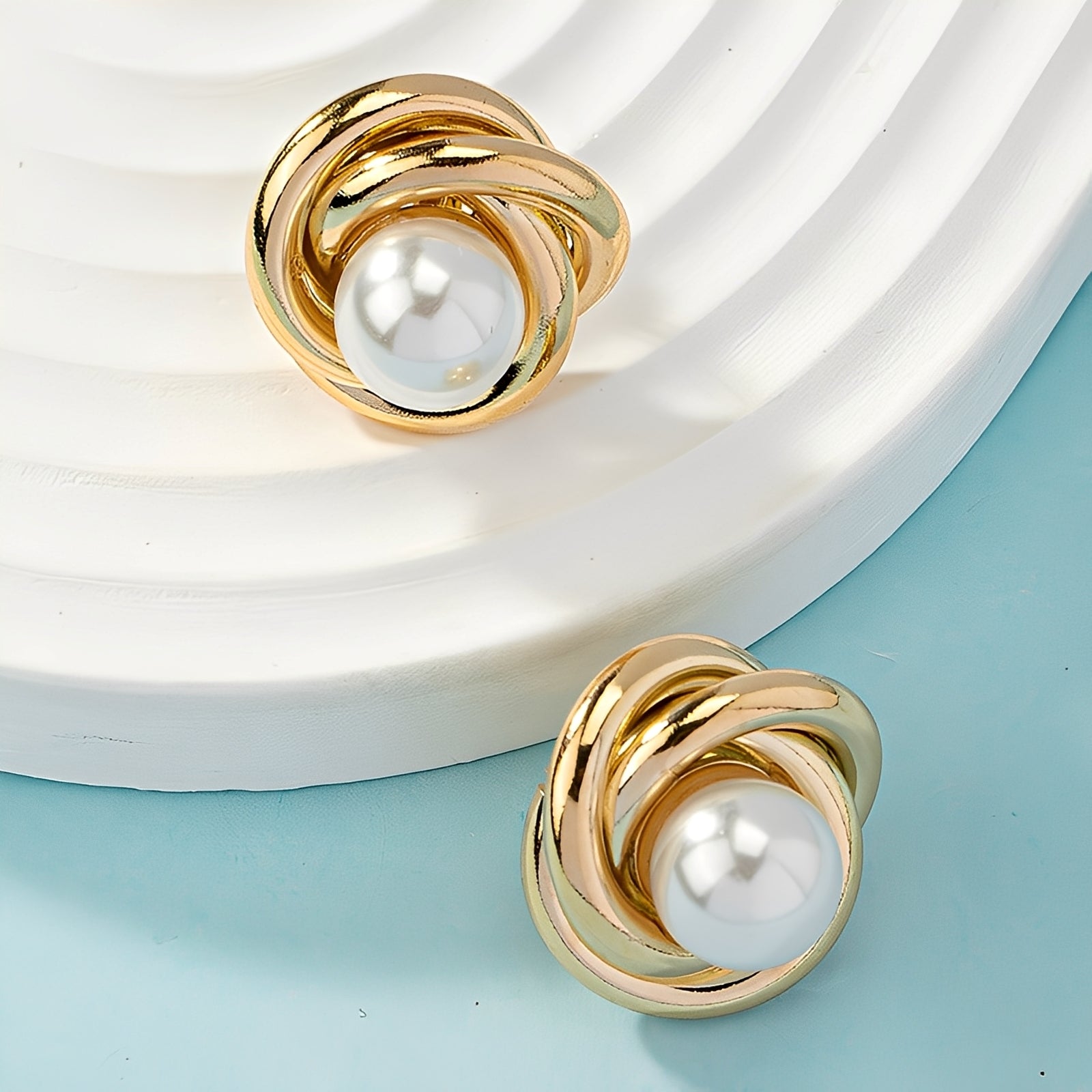 Krisna – Elegante Ohrringe aus Gold mit Perlen