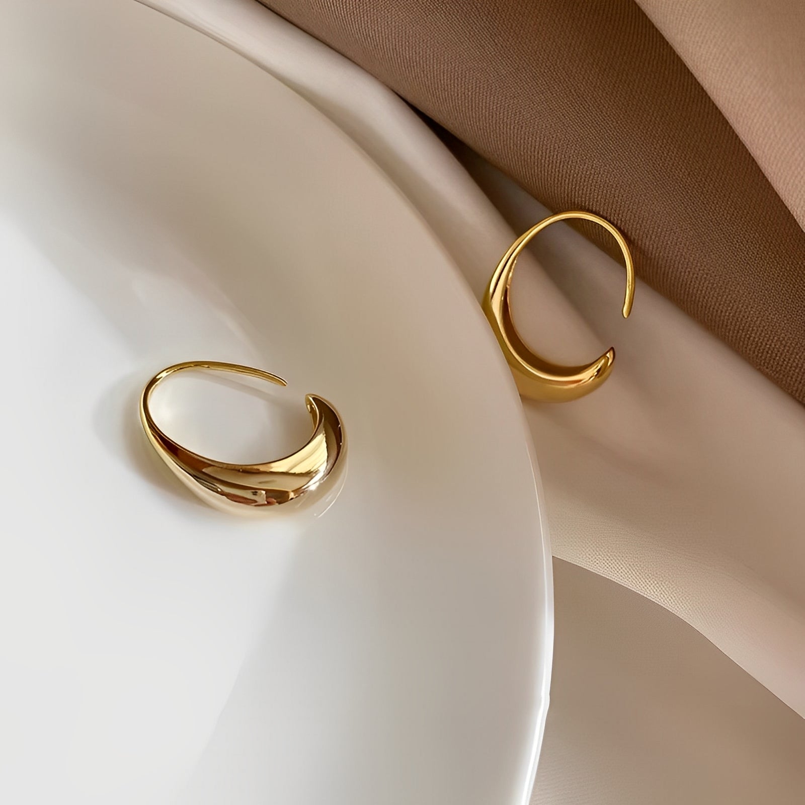 Aura – Luxus-Ohrringe in Gold