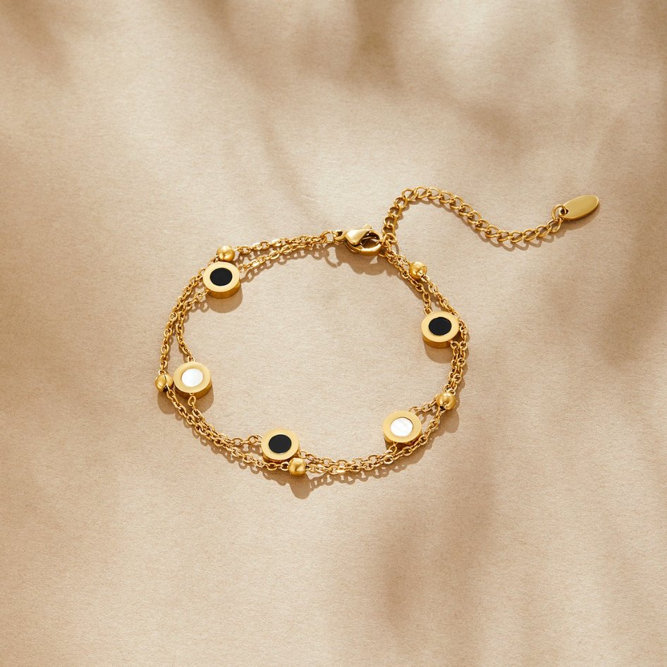 Nyra – Armband Onyx und Weißer Stein