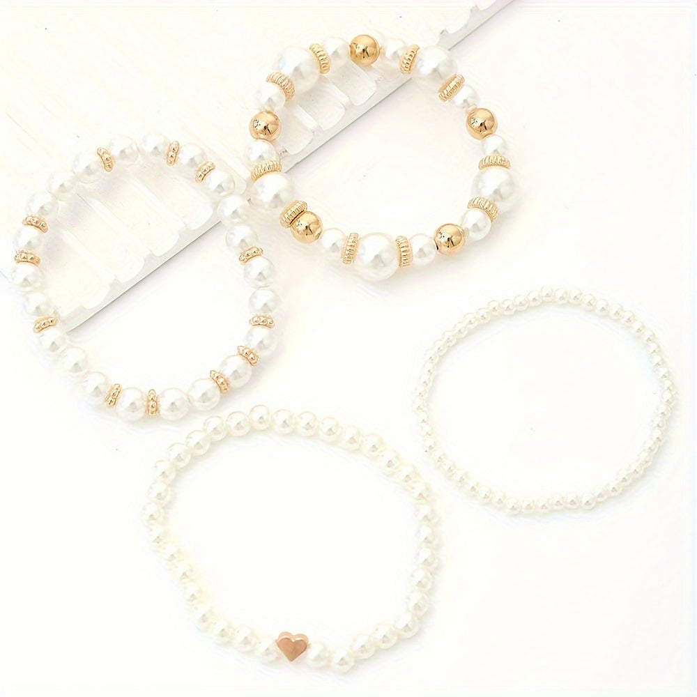Elaine – Set von 4 Armbändern mit weißen Imitationsperlen