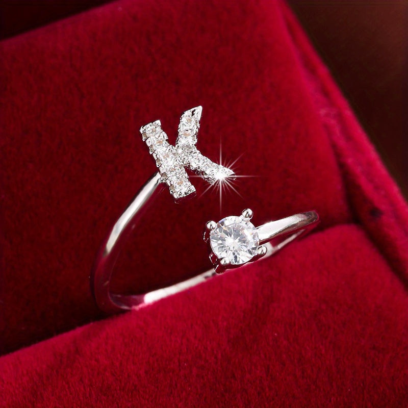 Nova – Moderner Offener Ring mit Initiale und Zirkonia
