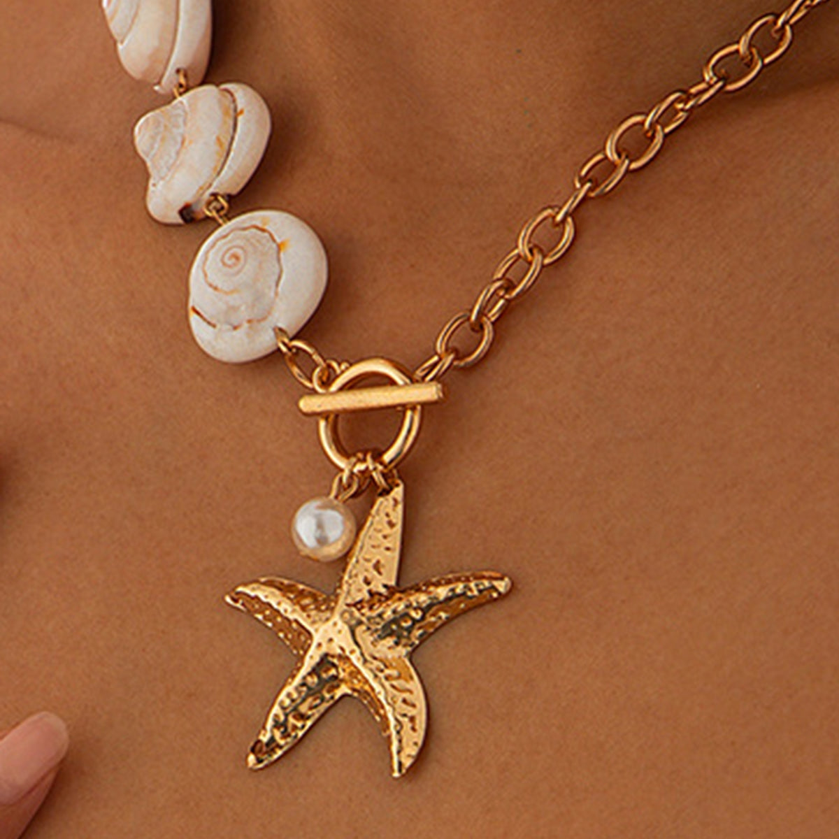 Coralie – Collier Coquillage & Étoile de Mer Doré