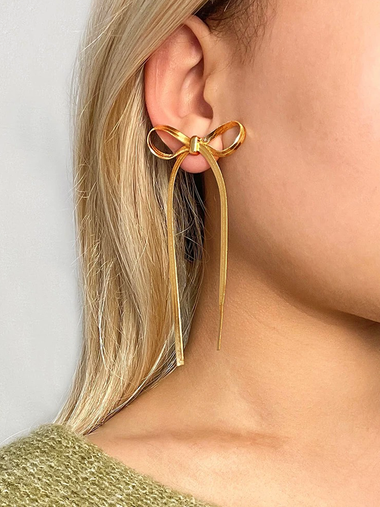 Cate – Lange Ohrringe Goldene Schlange Kette Knoten