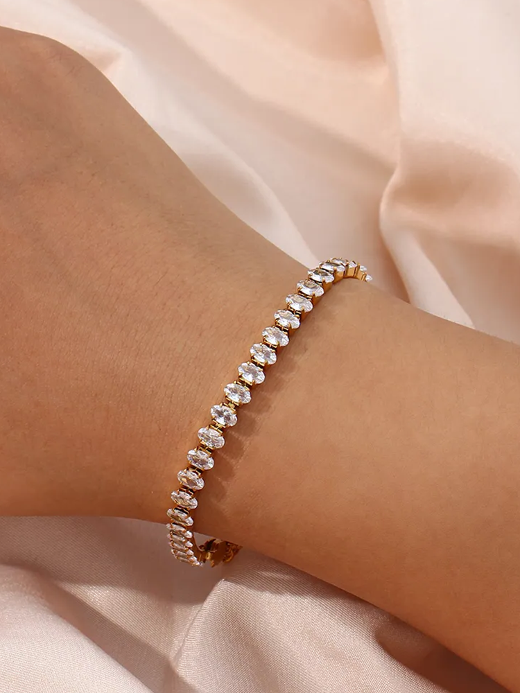 Norah – Tennis Armband Gold mit Ovalen Gliedern