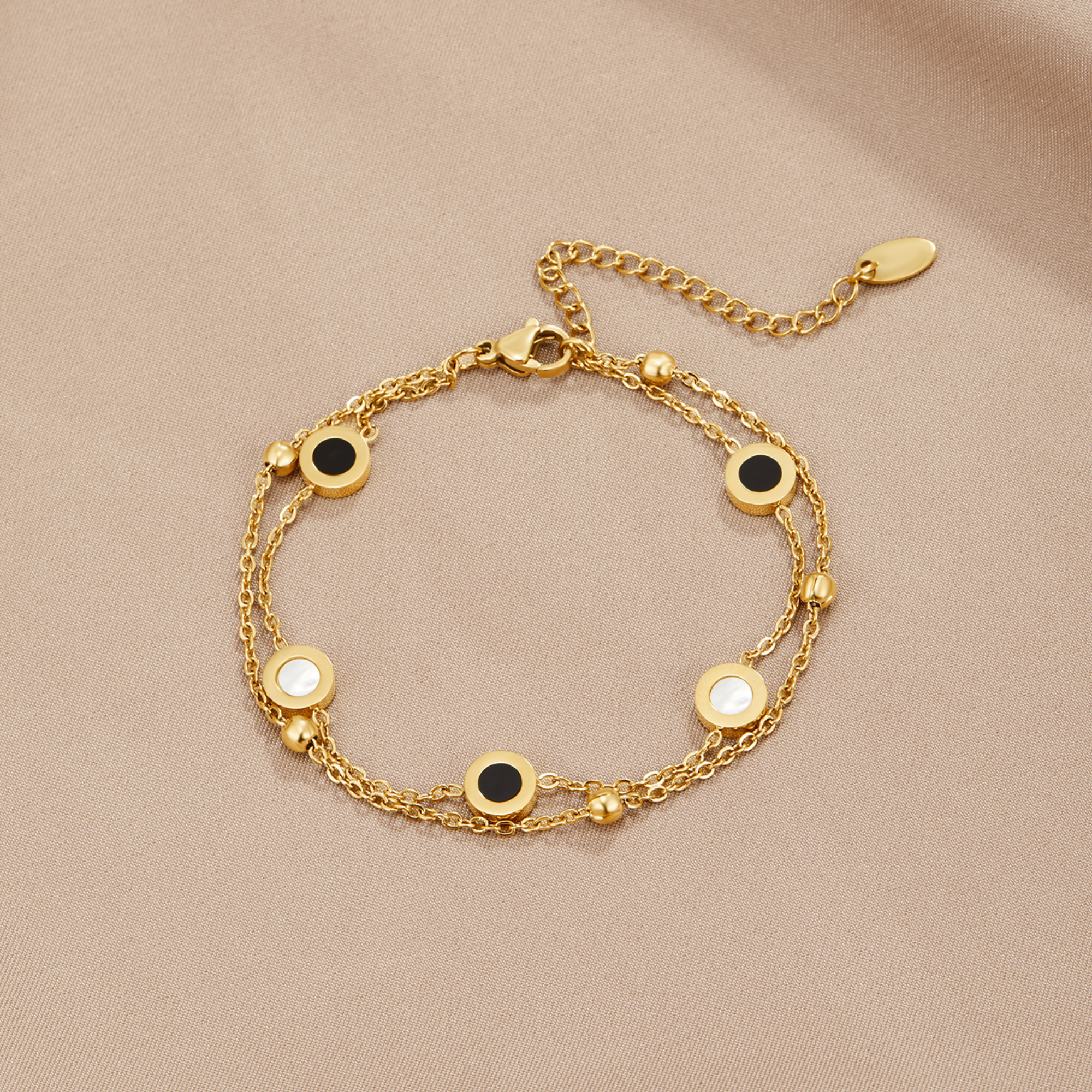 Nyra – Armband Onyx und Weißer Stein