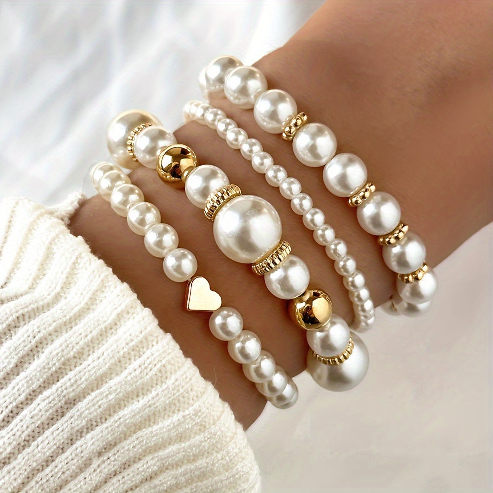Elaine – Set von 4 Armbändern mit weißen Imitationsperlen