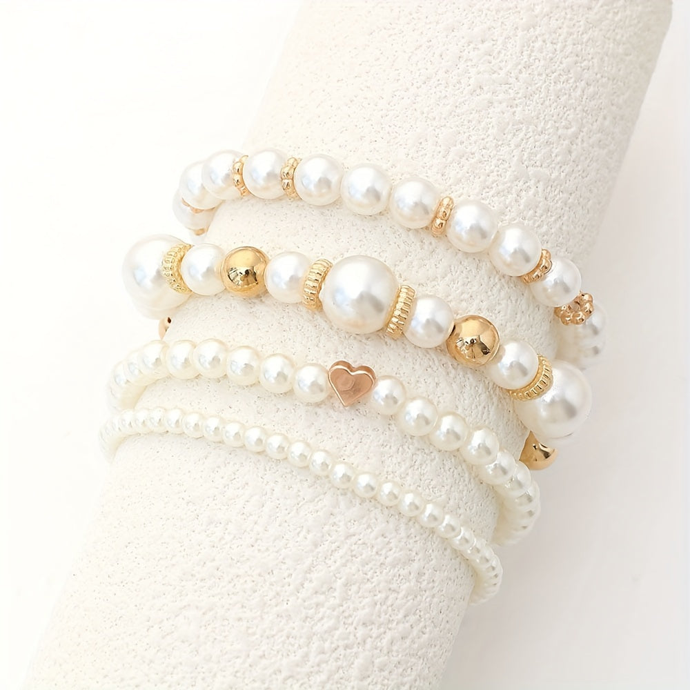 Elaine – Set von 4 Armbändern mit weißen Imitationsperlen