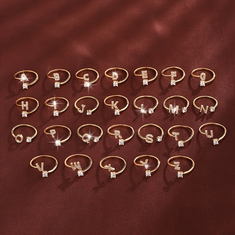 Nova – Moderner Offener Ring mit Initiale und Zirkonia