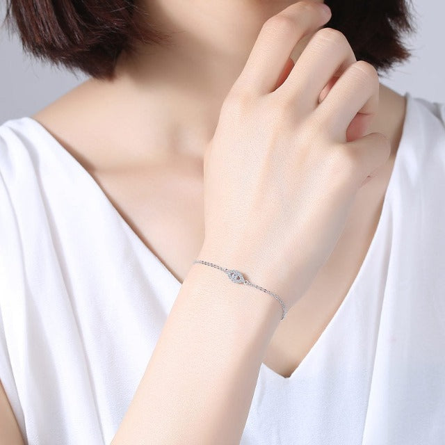 Thalassa – Silbernes Armband Blaues Schutzauge