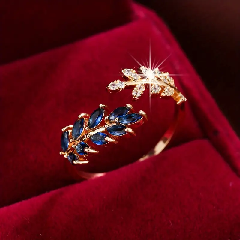Azura – Offener Goldring mit Blatt und blauem Zirkonia