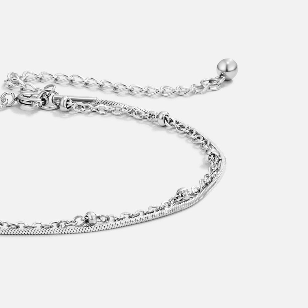 Pia – Silbernes Armband in Schichten